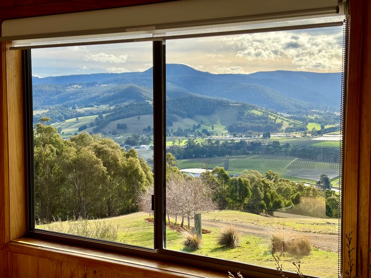 View across the Huon Valley from inside the cottage