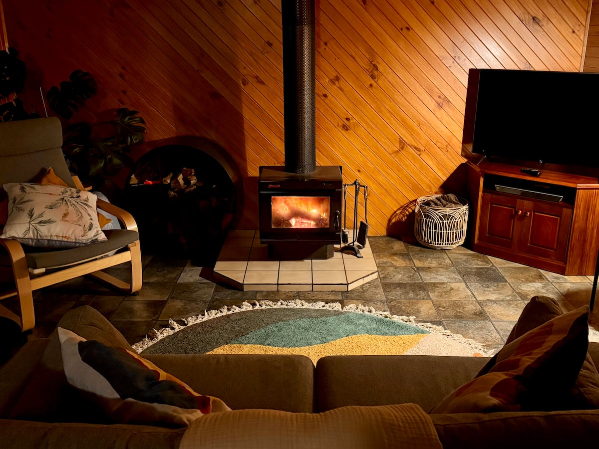 Wood fire glowing inside the cottage