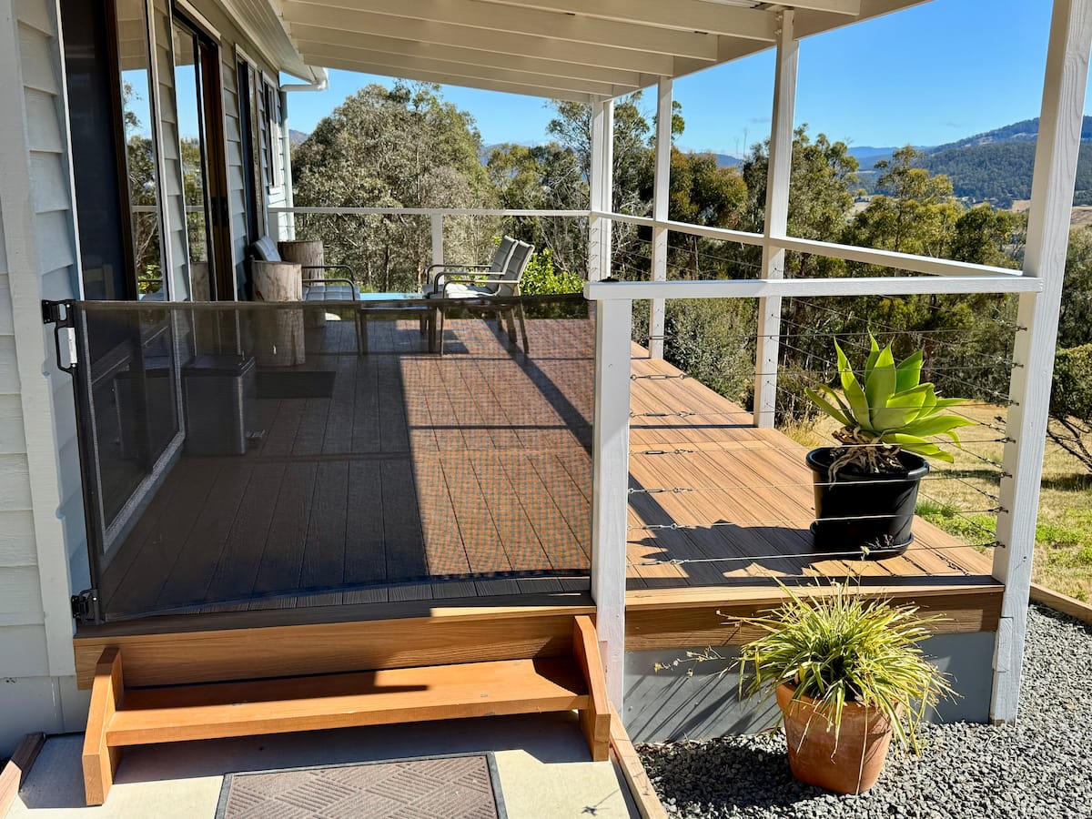 Covered balcony entry at Allens Cottage